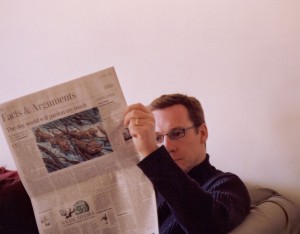 Man-Reading-Newspaper