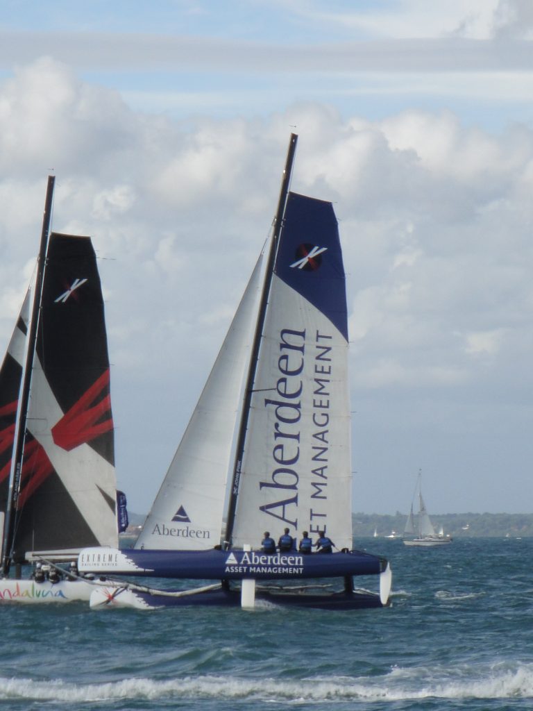 Fund management in full sail: Aberdeen Asset Management sponsored Extreme 40 catamaran racing during Cowes Week. Photo Editor5807, This file is licensed under the Creative Commons Attribution 3.0 Unported license.