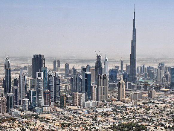 Dubai skyline with Burj Khalifa from a helicopter. Photo by Tim Reckman. Licensed under the Creative Commons Attribution-Share Alike 3.0 Unported license.