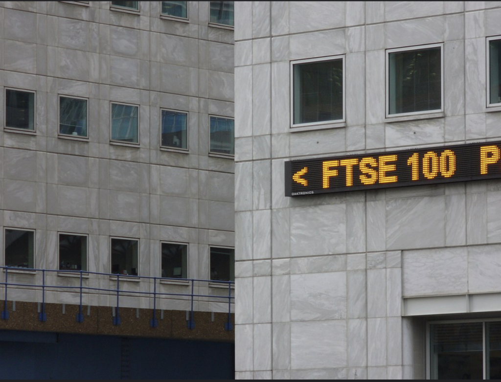 FTSE 100 sign at Canary Wharf. Photo: MetroCentric. Attribution 2.0 Generic creative commons license