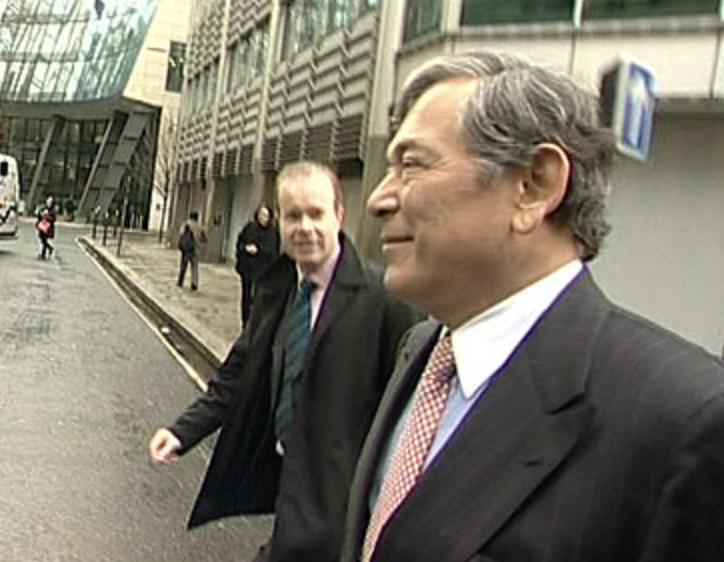 BBC business journalist Joe Lynam's questions to Lloyds Banking Group chief executive Eric Daniels are met with stony silence outside the bank's Gresham Street headquarters. Image: BBC News