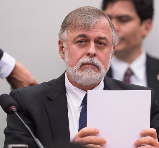 Paulo Roberto Costa, ex head of supply at Petrobras and whistleblower in Lava Jato affair gives evidence to Brazil's parliamentary inquiry into the scandal. Photo: Marcelo Camargo/ Agência Brasil. This file is licensed under the Creative Commons Attribution 3.0 Brazil license. https://commons.wikimedia.org/wiki/File:Paulo_Roberto_Costa-2015_05_05_1.jpg